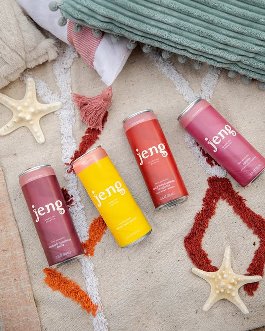 Jeng’s THC-infused alcohol-free cocktails arranged on a beach mat, ready for relaxed moments of zero-proof enjoyment.